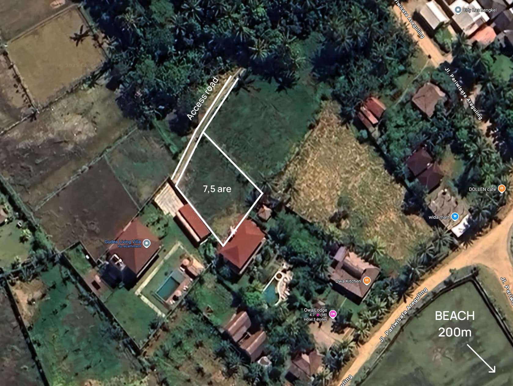 Aerial view of a 7.5 are plot outlined near villas and greenery in Areguling, Lombok