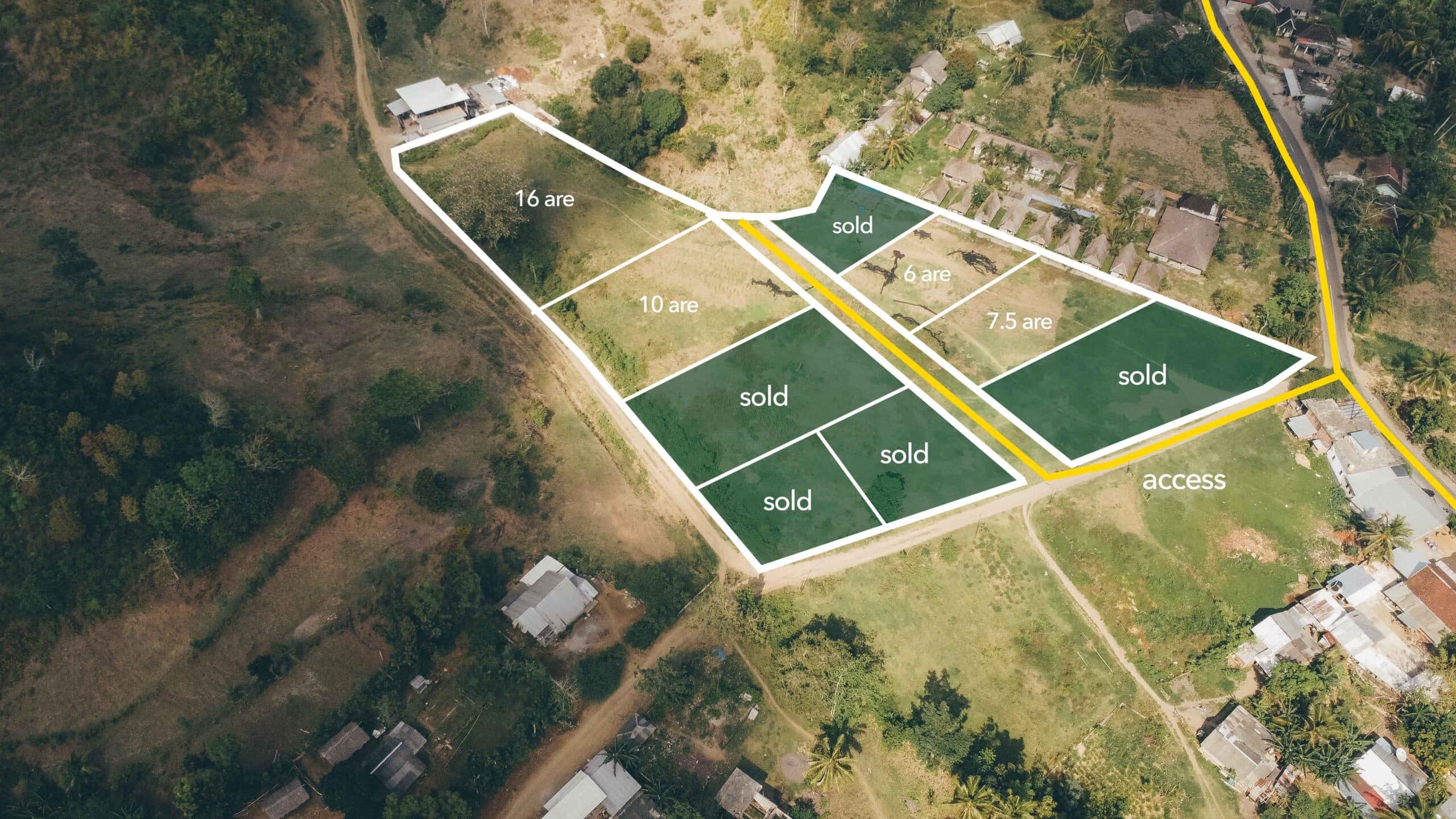 aerial view of selong belanak flat plots for sale with access line