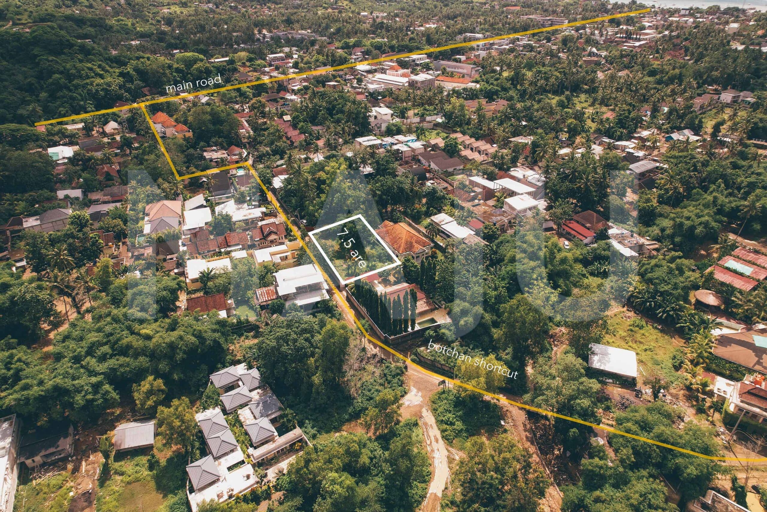 Aerial view of a 7.5 are plot for sale in central Kuta Lombok