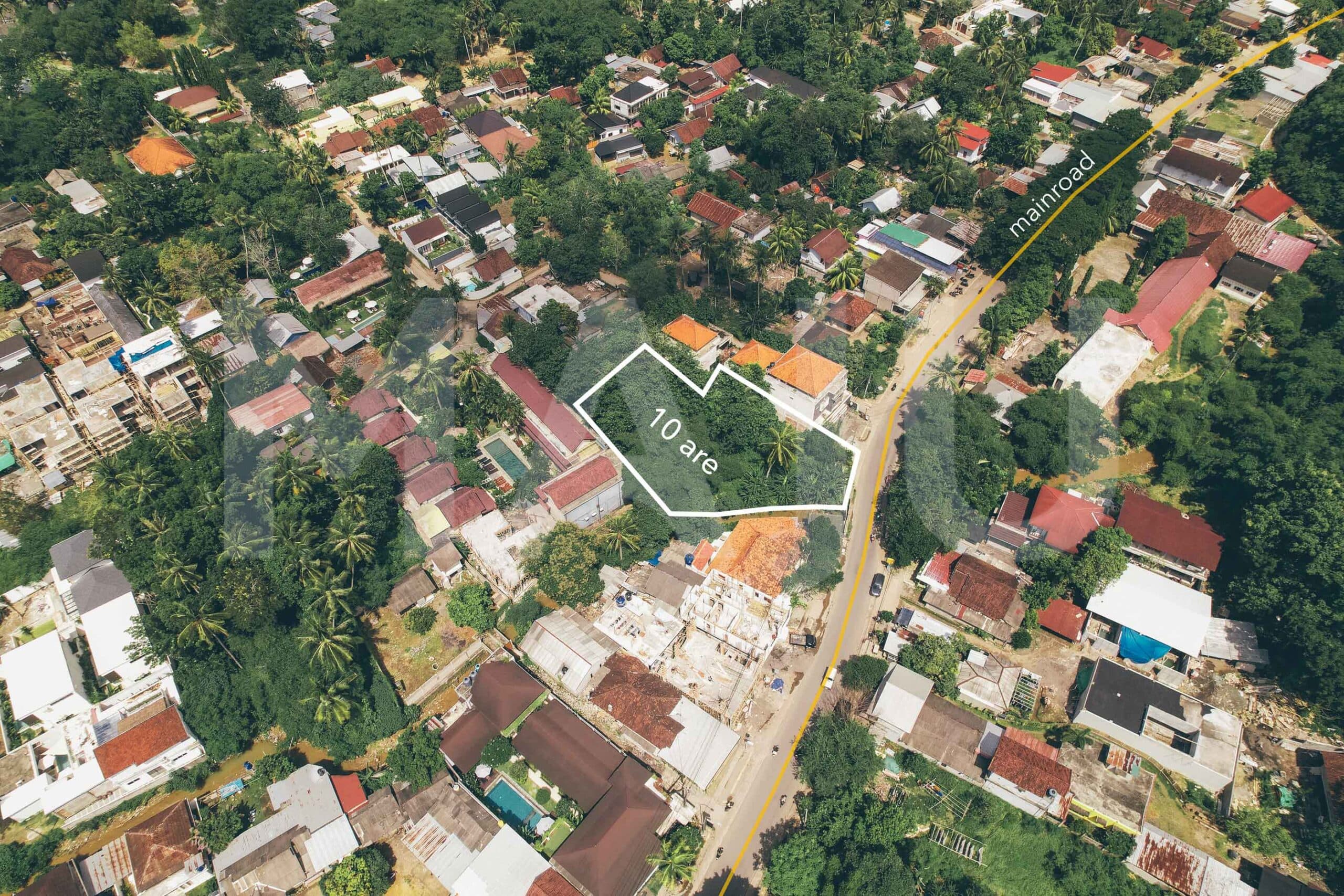 Aerial view of a 10 are plot for sale in central Kuta Lombok